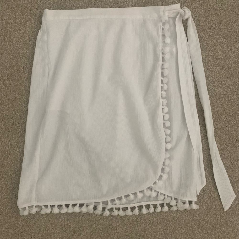 J Crew white swimsuit coverup with pompoms.
